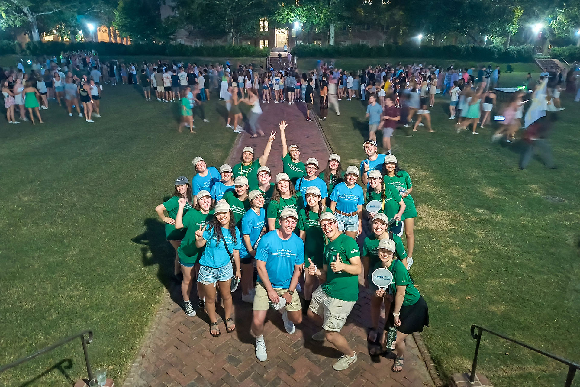 Batten School students celebrate together following William &amp; Mary’s Convocation Ceremony. (Photo by Siddhartha Mitra)